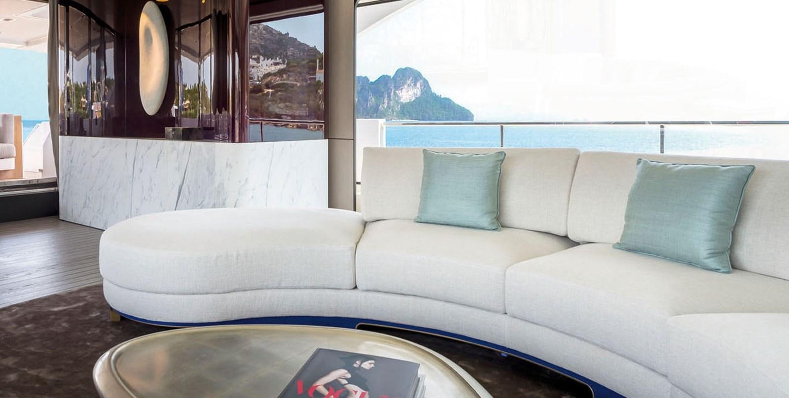 a couch in a room aboard VICIOUS RUMOUR II Yacht for Sale