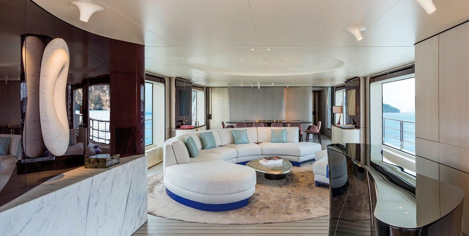 a large living room with a large open window aboard VICIOUS RUMOUR II Yacht for Sale