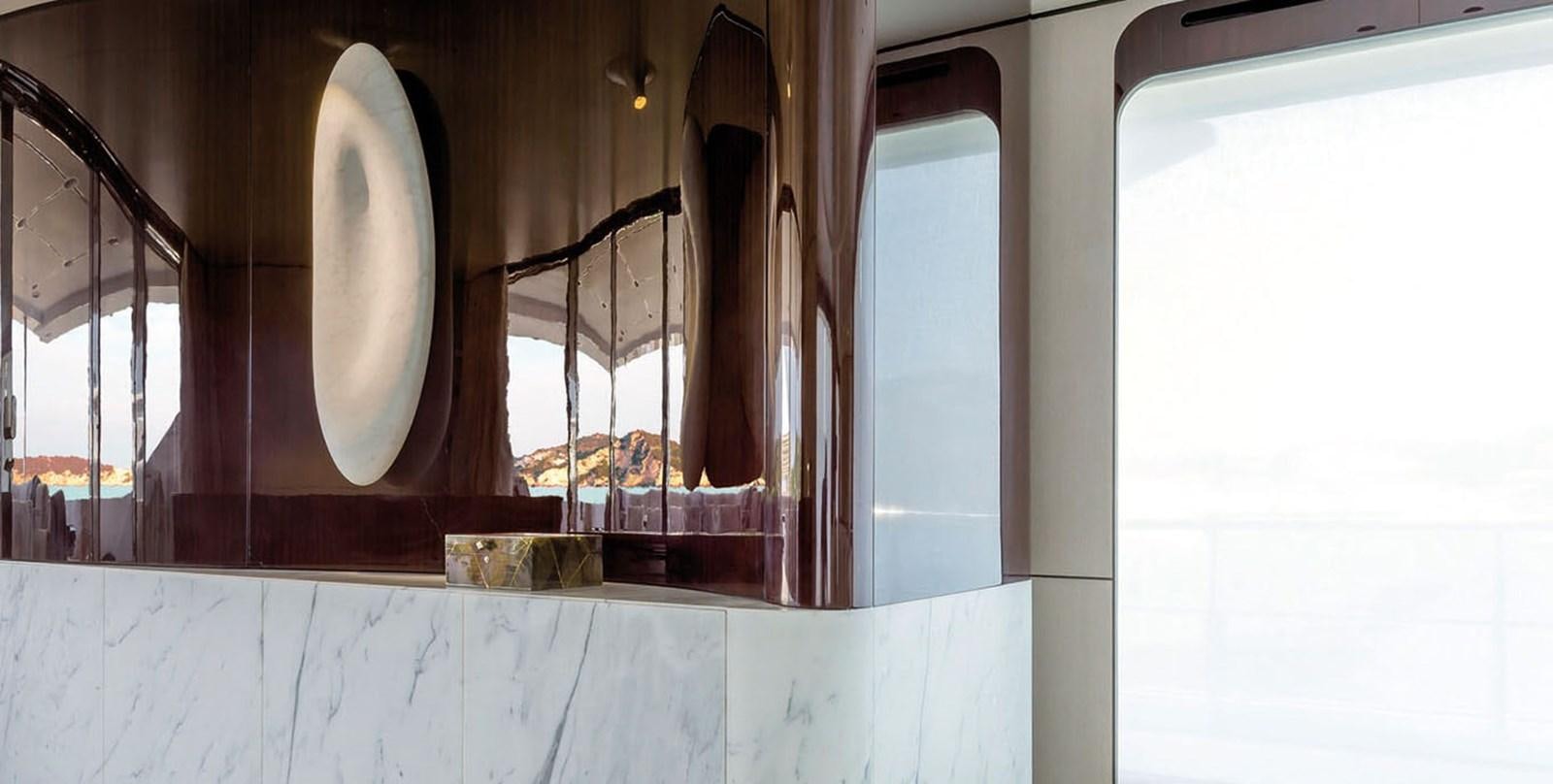 a window with a metal frame aboard VICIOUS RUMOUR II Yacht for Sale