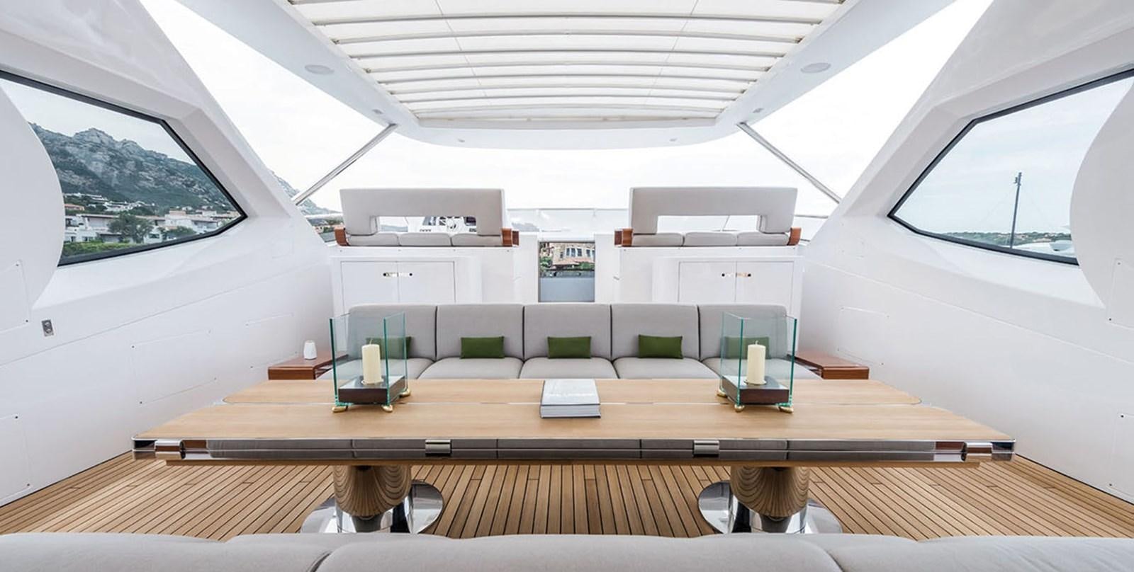 a room with a table and shelves aboard VICIOUS RUMOUR II Yacht for Sale