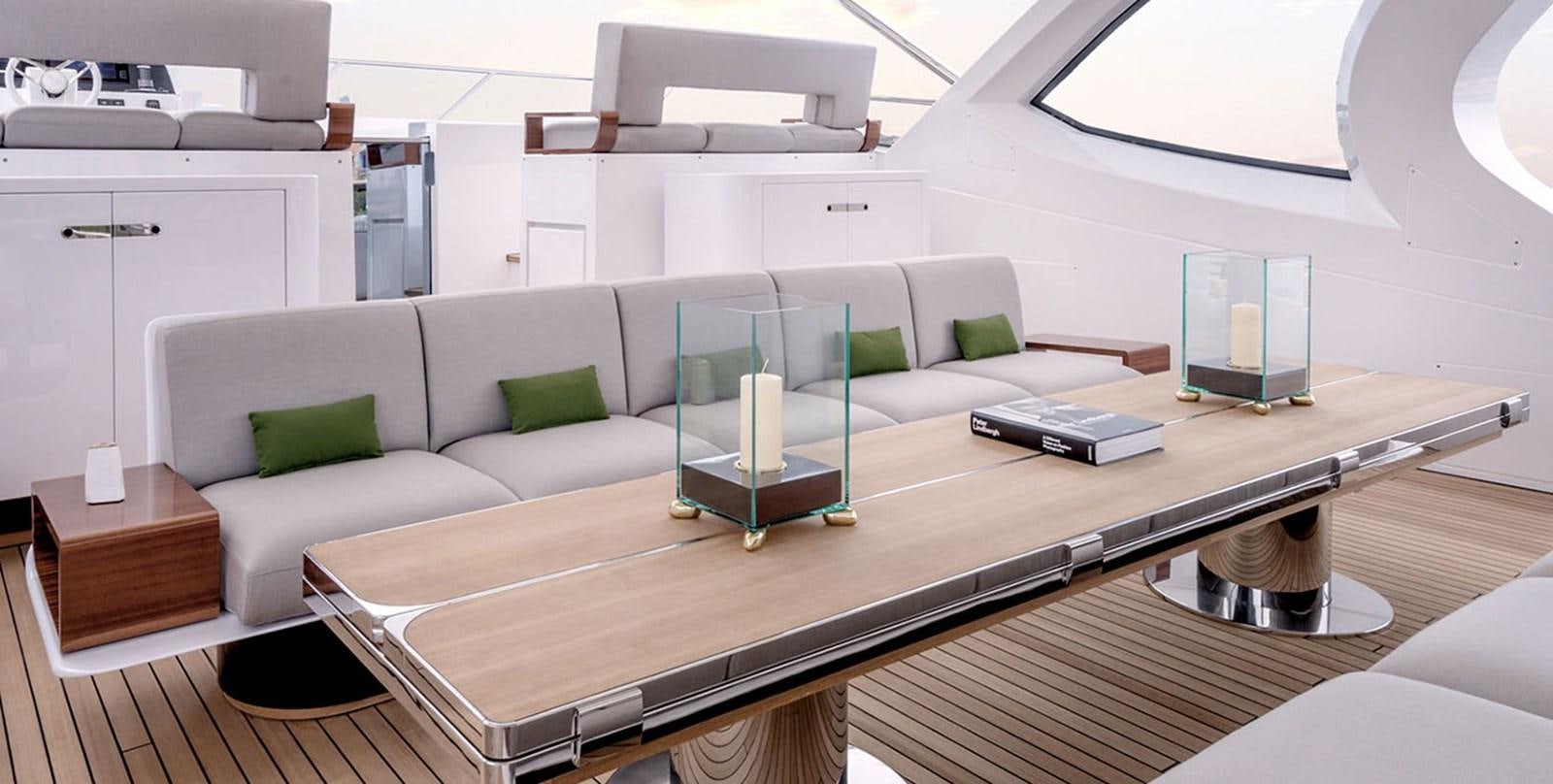 a room with a couch and a table aboard VICIOUS RUMOUR II Yacht for Sale
