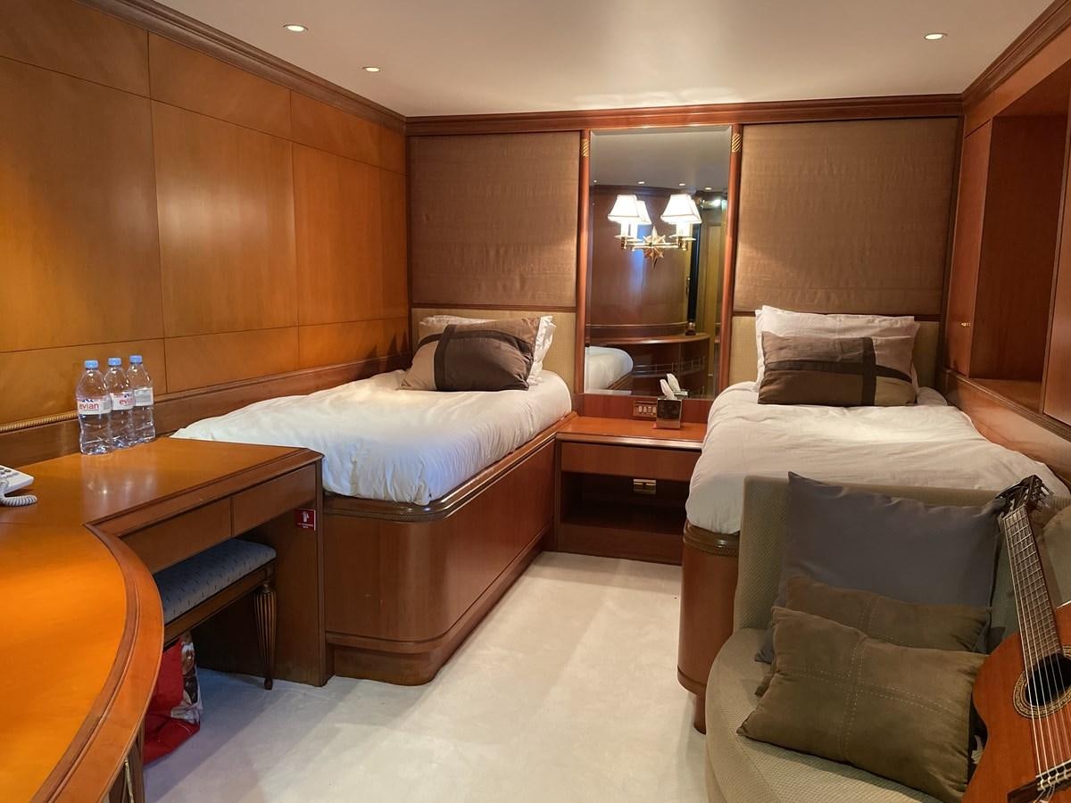 a room with two beds aboard GAUDEAMUS Yacht for Sale
