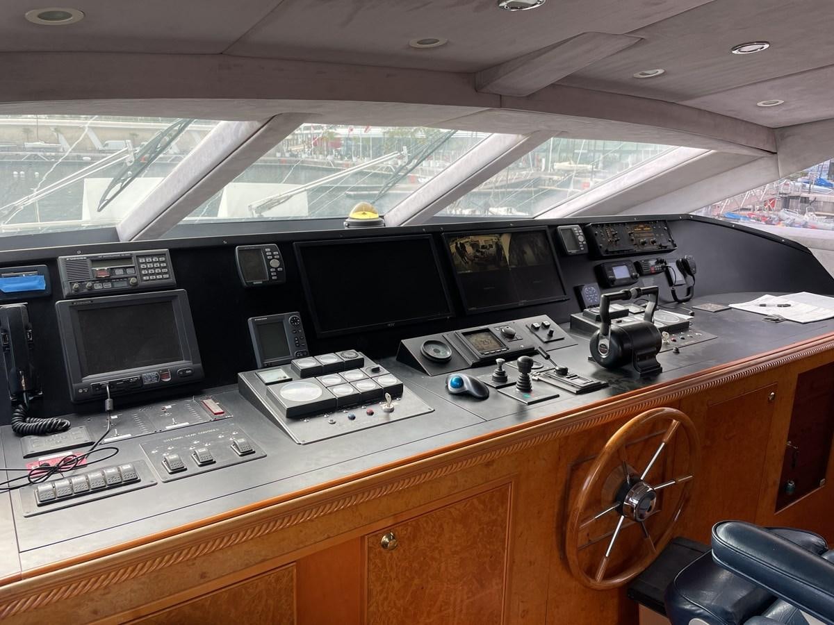 a control room with many monitors aboard GAUDEAMUS Yacht for Sale