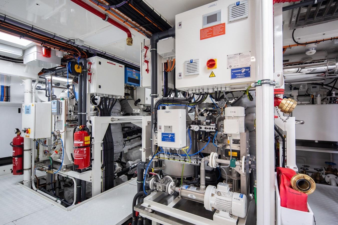 a room with machinery aboard MOONEN 110 MUSTIQUE Yacht for Sale