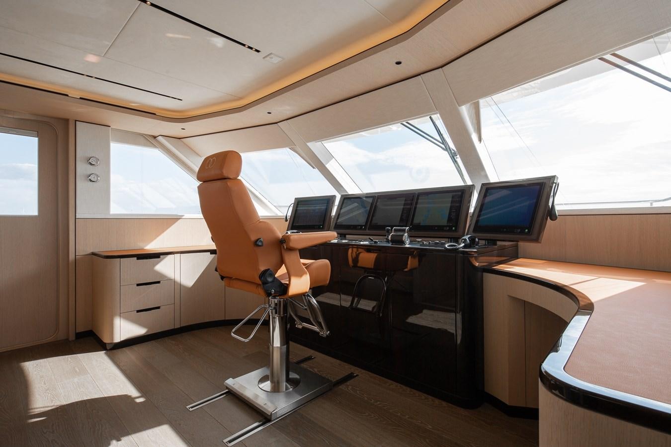 an orange toy in an office aboard MOONEN 110 MUSTIQUE Yacht for Sale