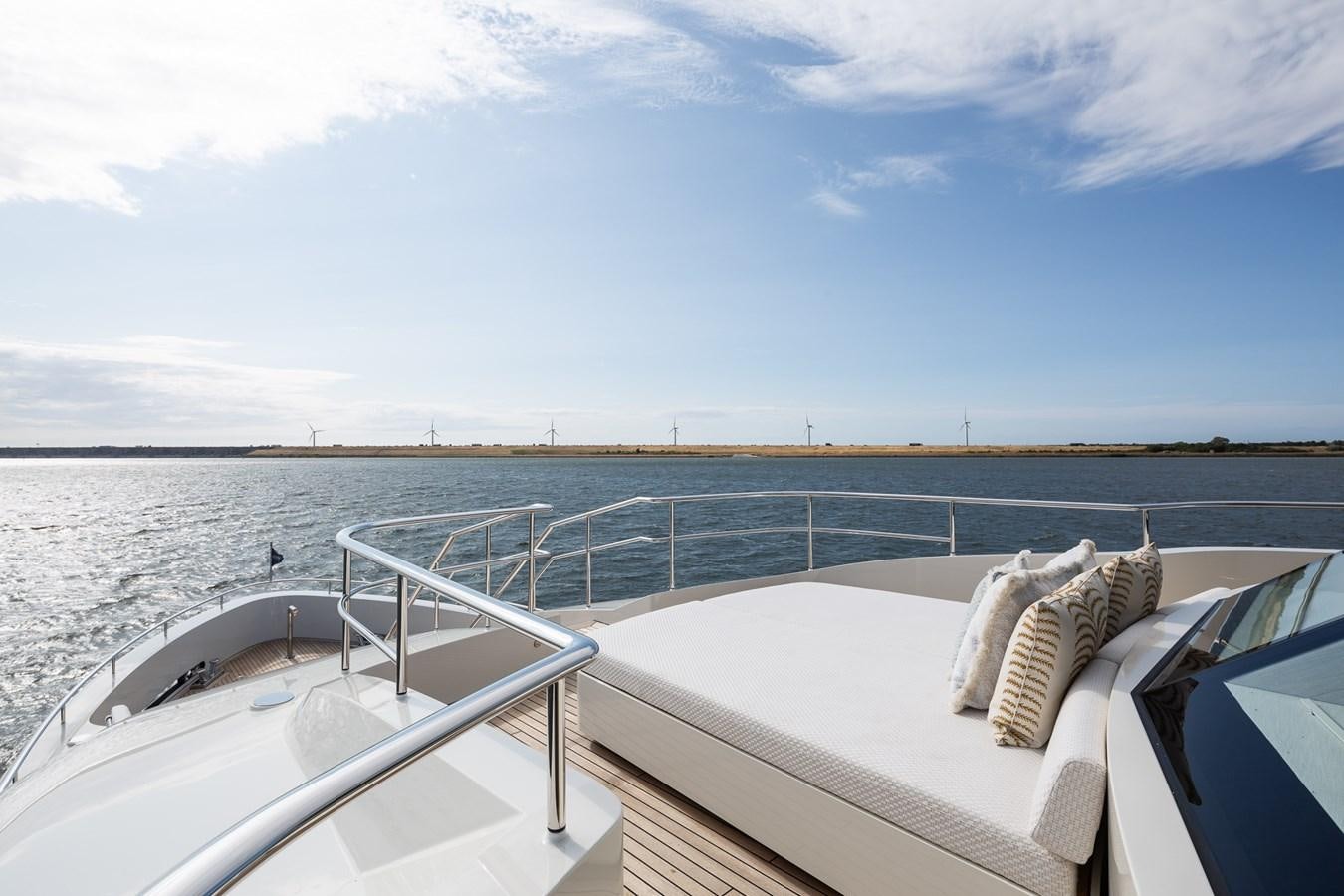 a boat on the water aboard MOONEN 110 MUSTIQUE Yacht for Sale