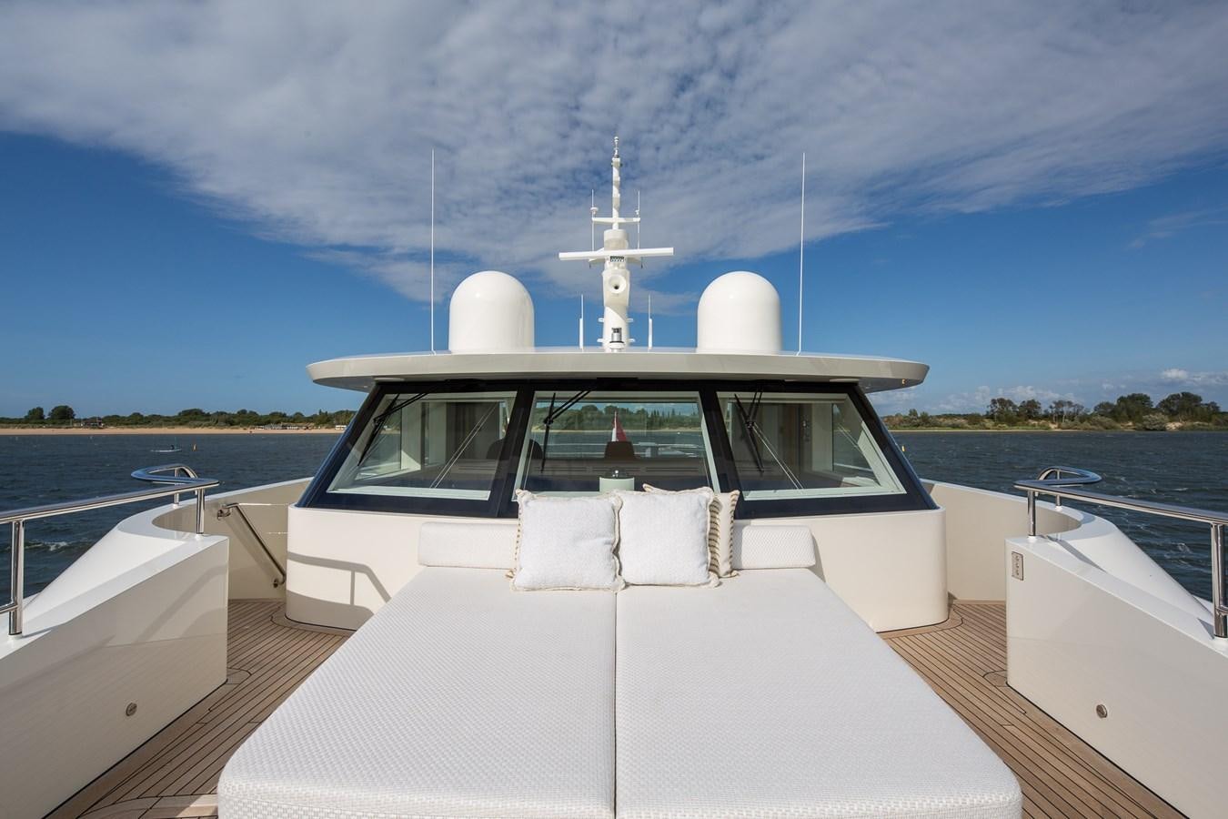 a boat on a body of water aboard MOONEN 110 MUSTIQUE Yacht for Sale