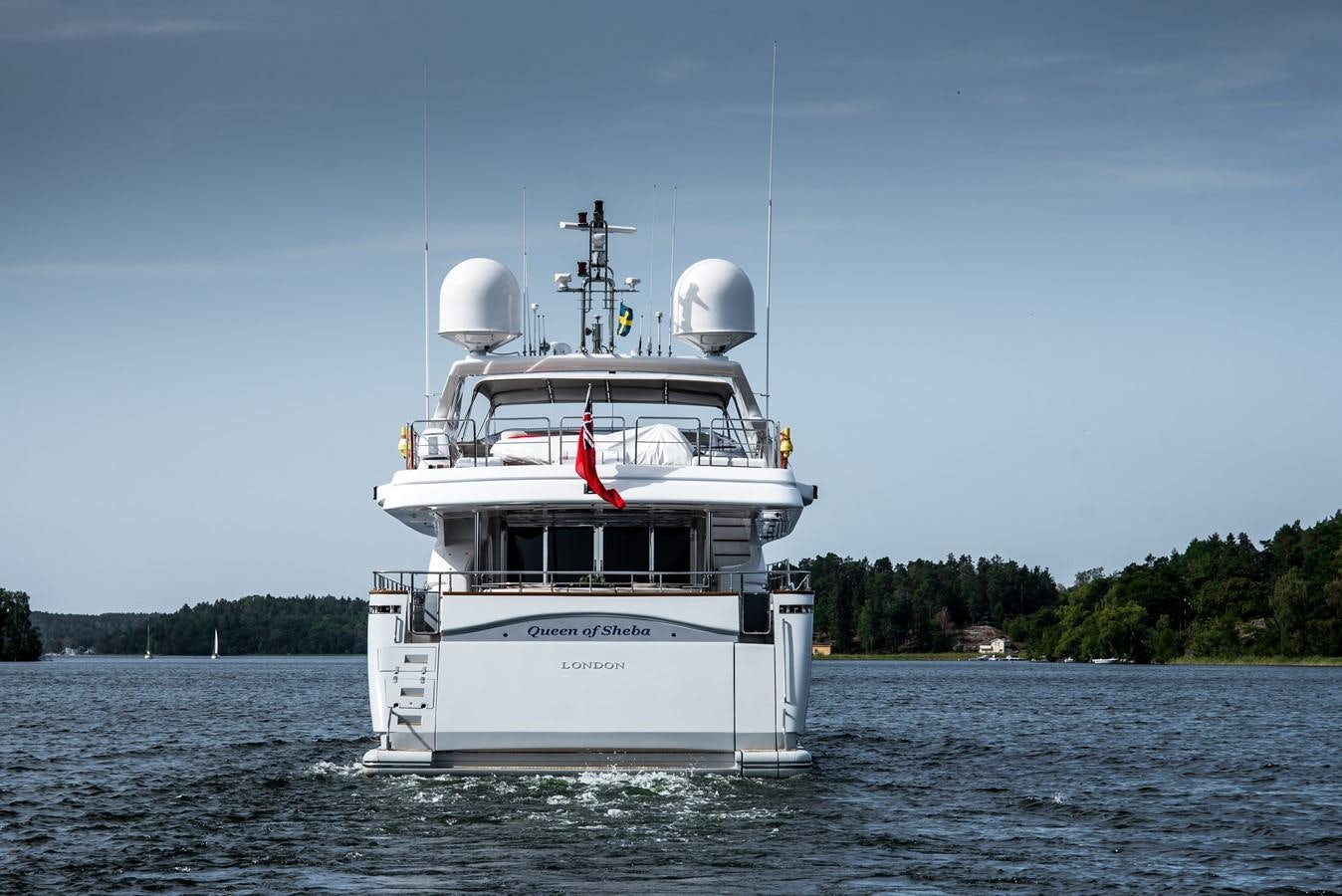 a large white ship in the water aboard QUEEN OF SHEBA Yacht for Sale