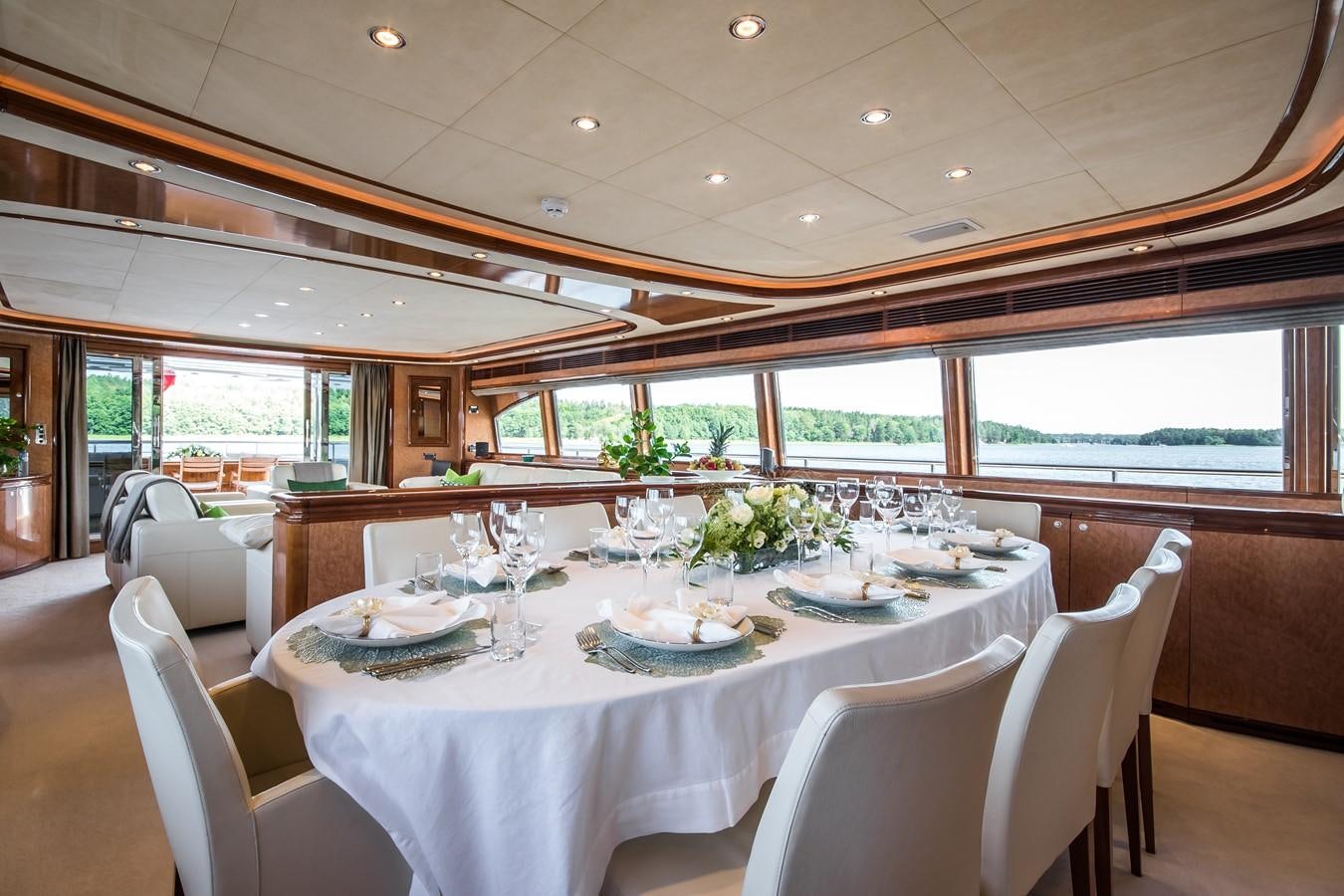a dining table set for a meal aboard QUEEN OF SHEBA Yacht for Sale