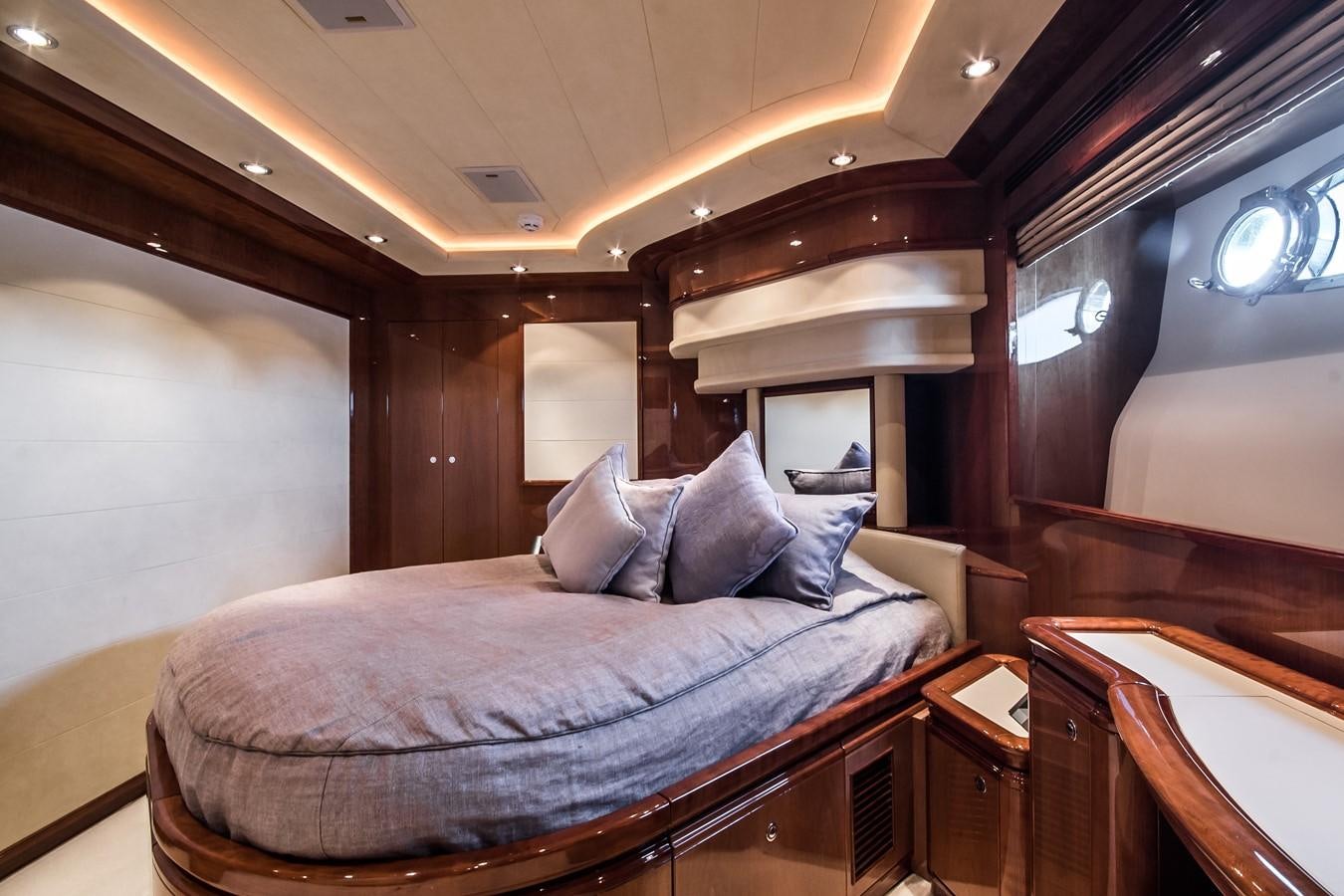 a bed in a room aboard QUEEN OF SHEBA Yacht for Sale