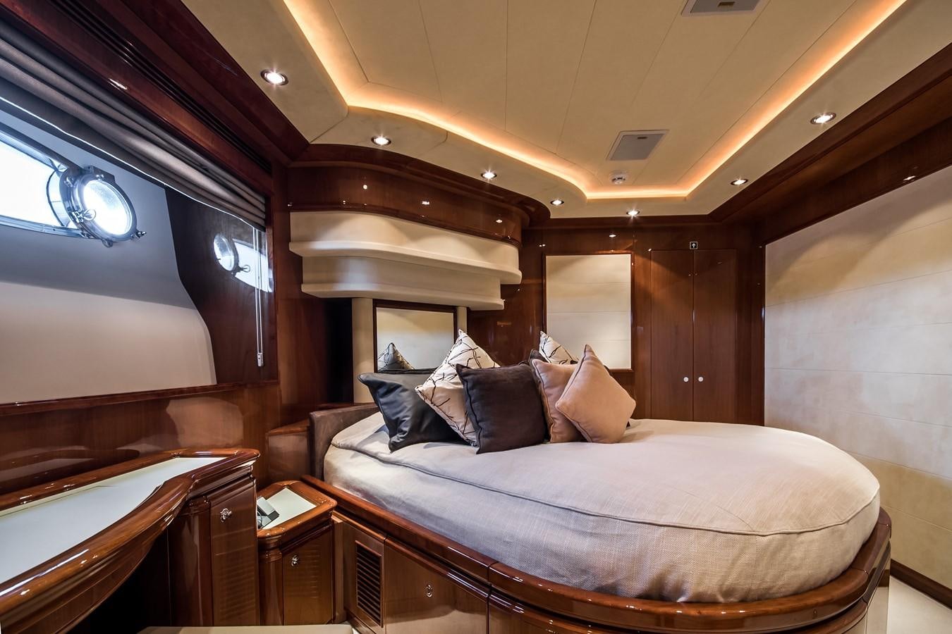 a bed in a room aboard QUEEN OF SHEBA Yacht for Sale
