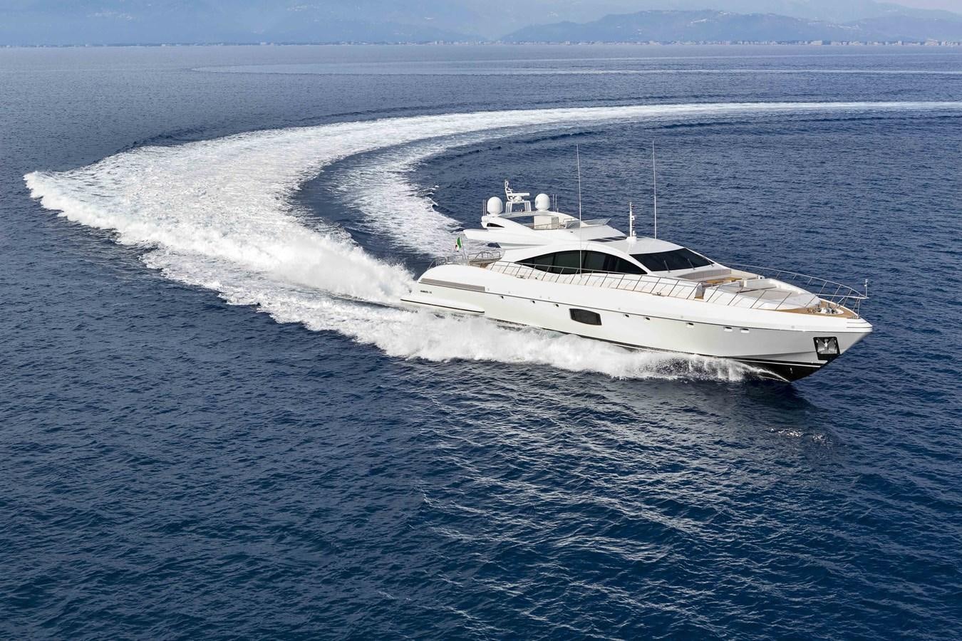 a white yacht on the water aboard MANGUSTA 110 - CAREFULLY USED Yacht for Sale