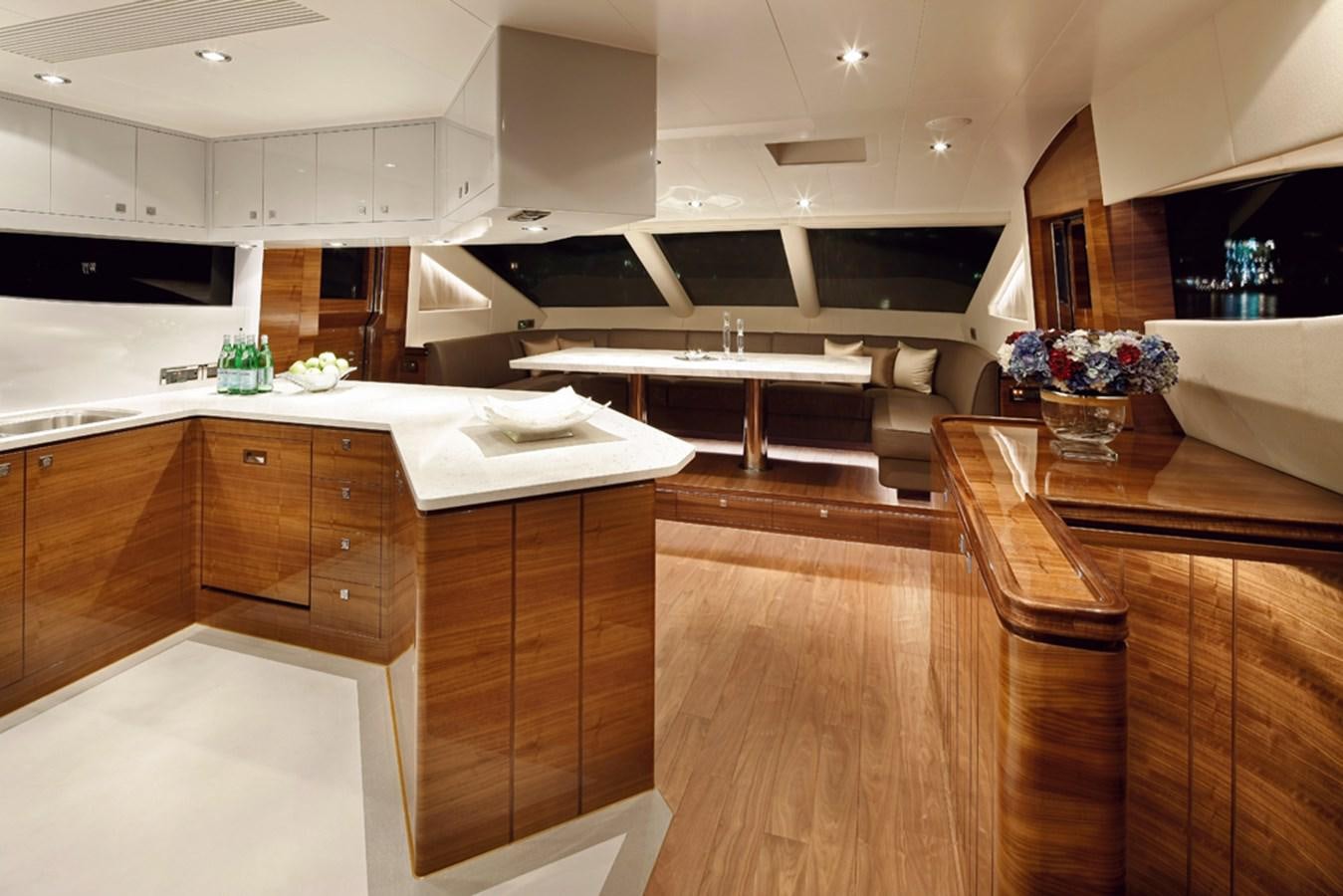 a kitchen with wooden cabinets aboard P110 (NEW BOAT SPEC)  Yacht for Sale