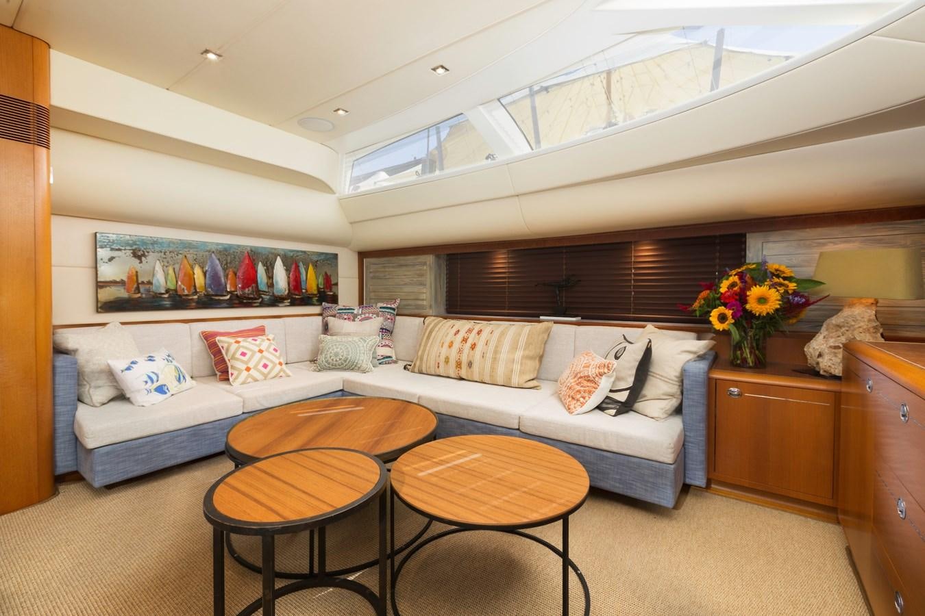 a bedroom with a bed and a table aboard DANNESKJOLD Yacht for Sale