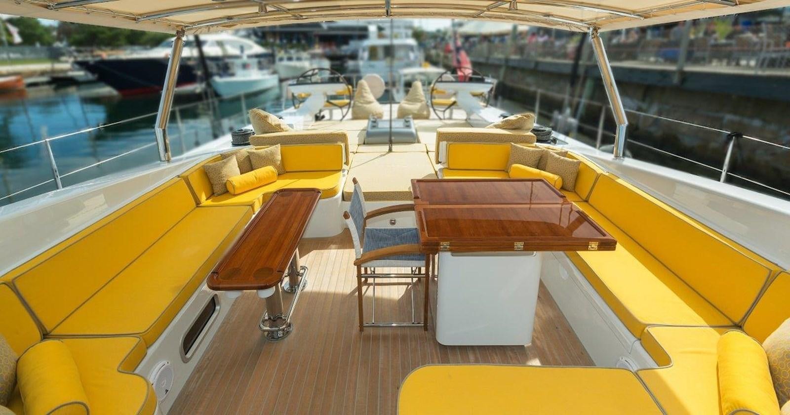 a boat with tables and chairs aboard DANNESKJOLD Yacht for Sale