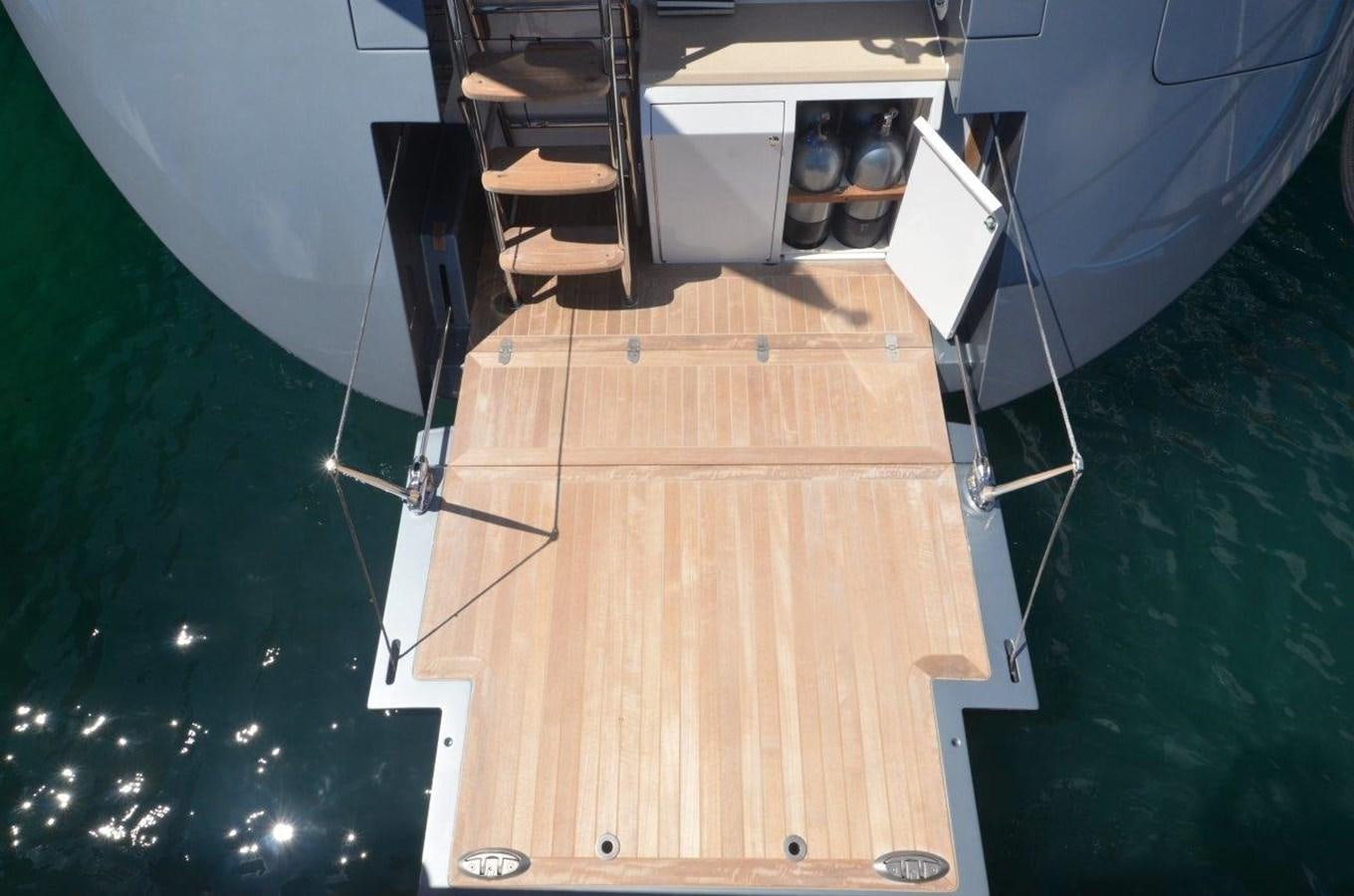 a wooden box with a wooden box on top of it aboard DANNESKJOLD Yacht for Sale
