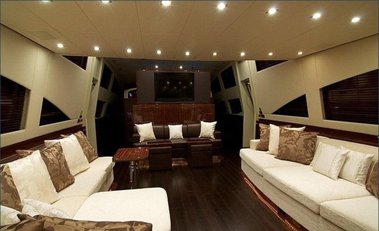 a living room with a wood floor aboard WHITE PEARL Yacht for Sale