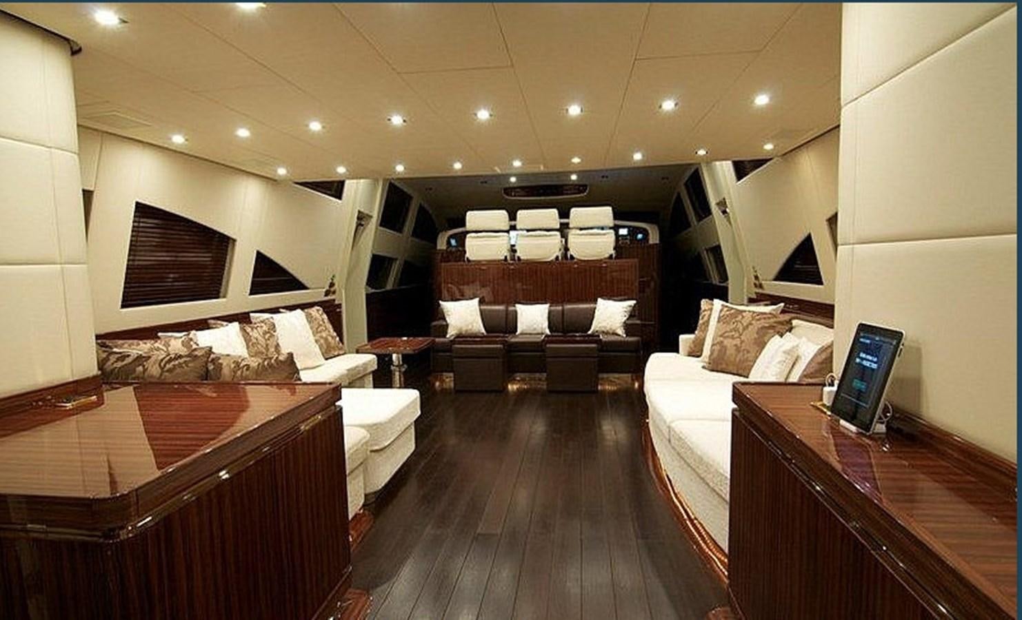 a room with a bed and a desk aboard WHITE PEARL Yacht for Sale