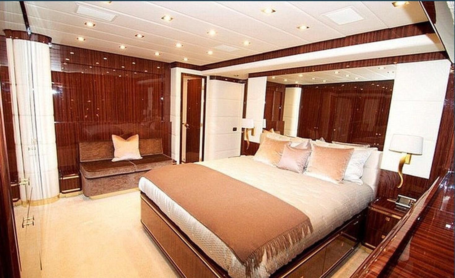 a large bed in a hotel room aboard WHITE PEARL Yacht for Sale