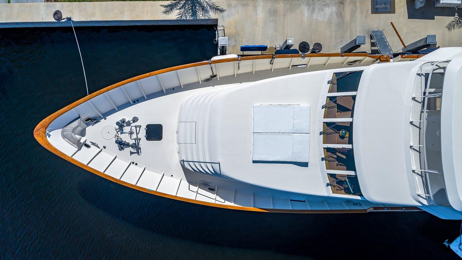 a large white boat with a blue roof aboard SEAQUEL Yacht for Sale