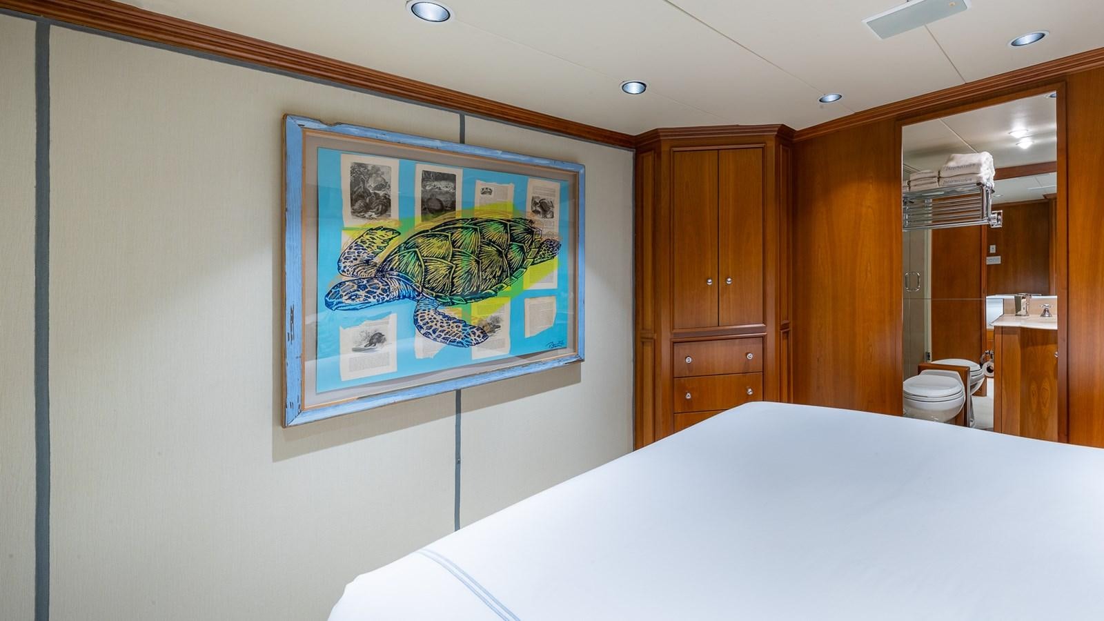 a bed in a room aboard SEAQUEL Yacht for Sale