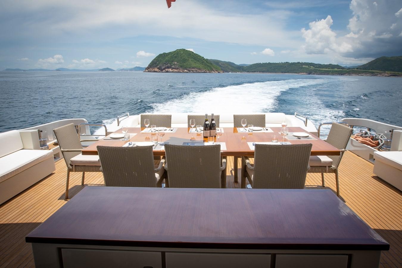 a table on a boat aboard AQUARIUS Yacht for Sale