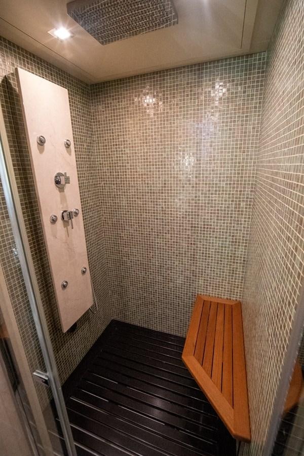 a wooden door in a room aboard AQUARIUS Yacht for Sale