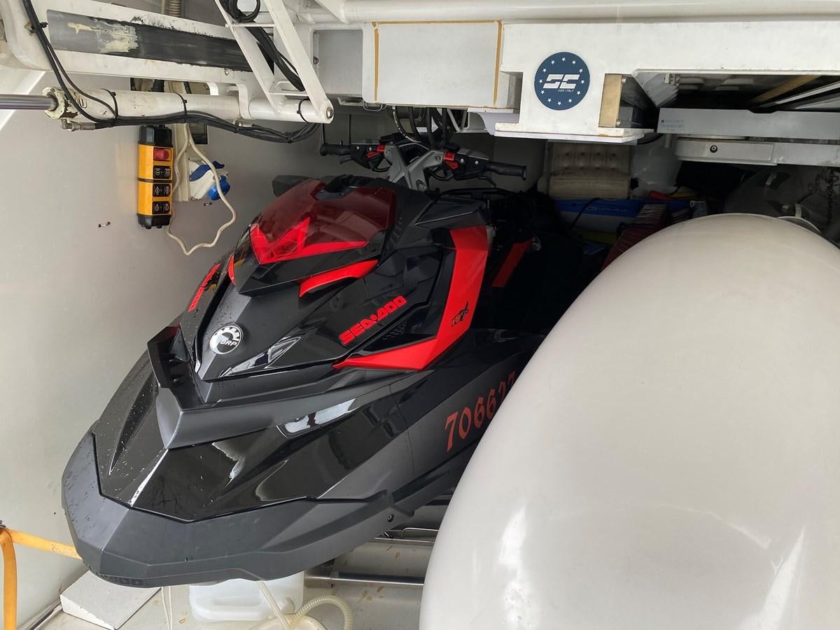 a car with a hood open aboard AQUARIUS Yacht for Sale