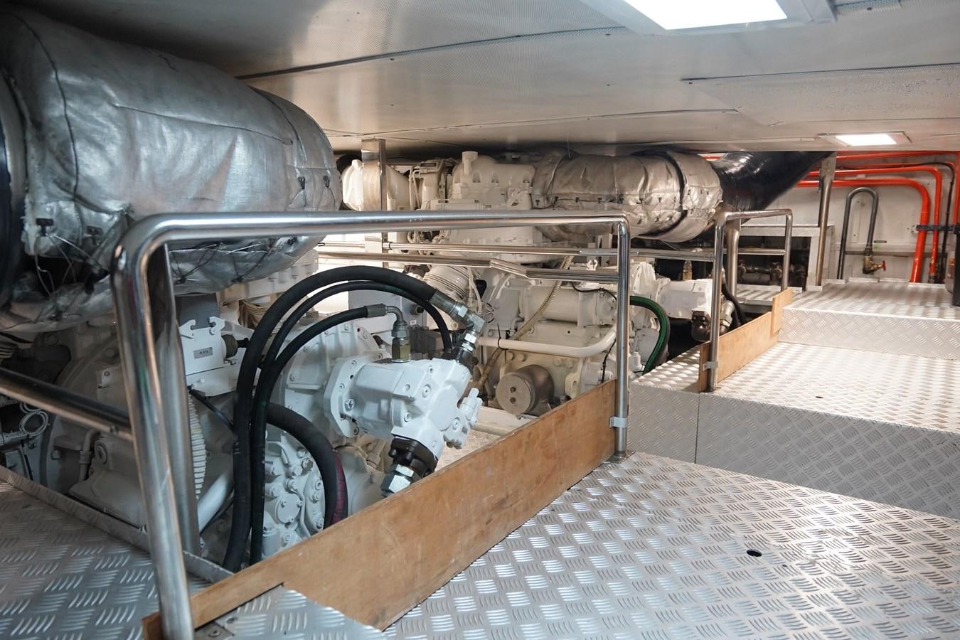 a large machine with a large metal cylinder aboard AQUARIUS Yacht for Sale