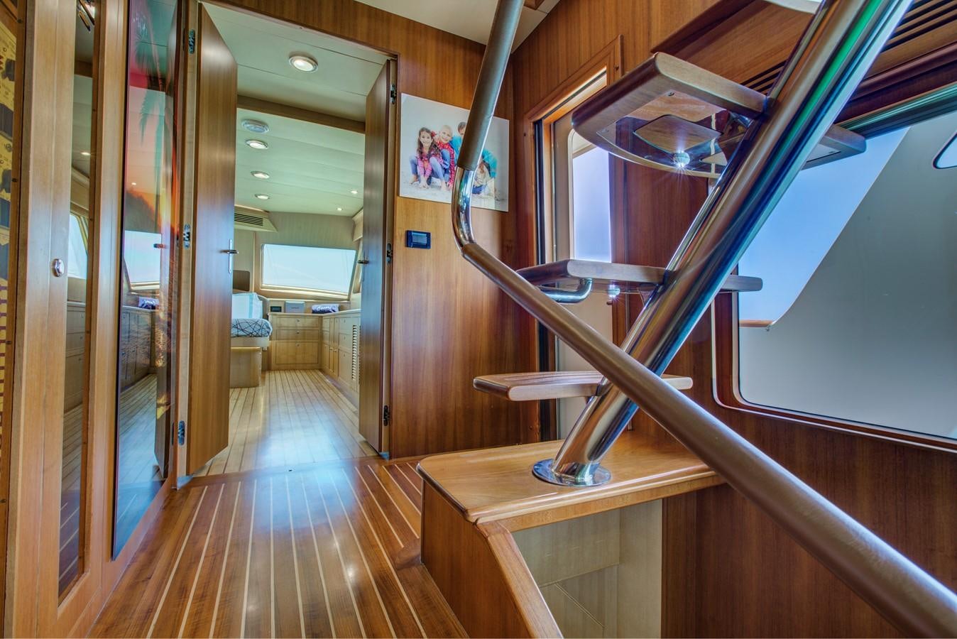 a hallway with wood floors aboard EXPLORER 97E-CB Yacht for Sale