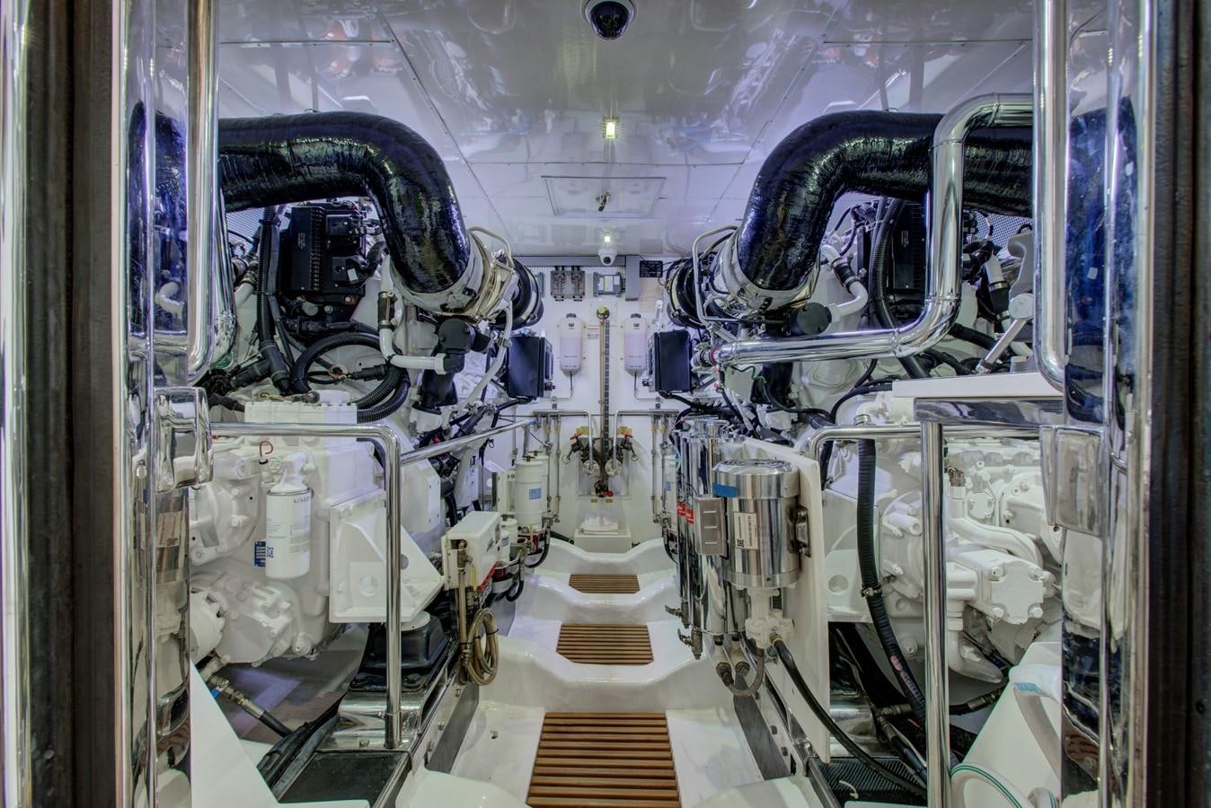 a large room with machines aboard EXPLORER 97E-CB Yacht for Sale