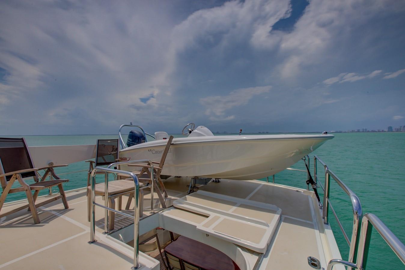 a boat on a body of water aboard EXPLORER 97E-CB Yacht for Sale