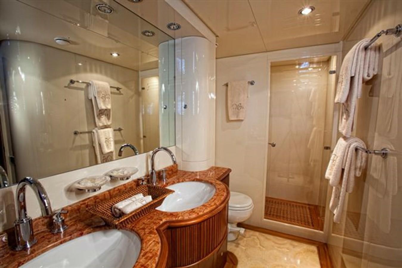 a bathroom with a large mirror aboard DANIELA Yacht for Sale