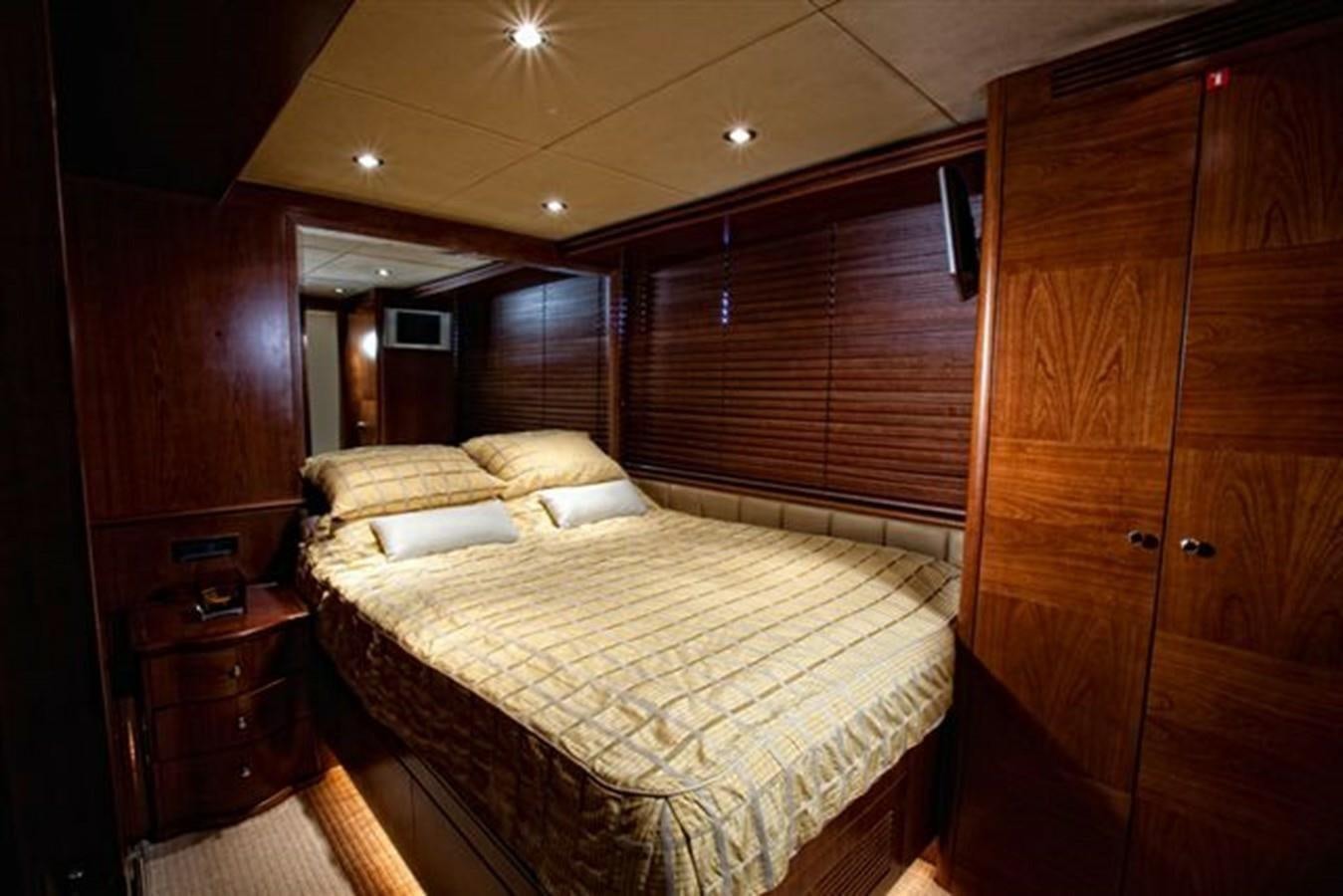 a bed in a room aboard DANIELA Yacht for Sale