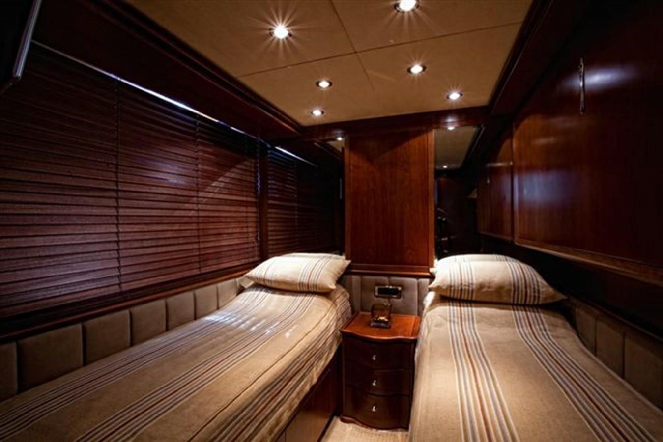 a room with two beds aboard DANIELA Yacht for Sale
