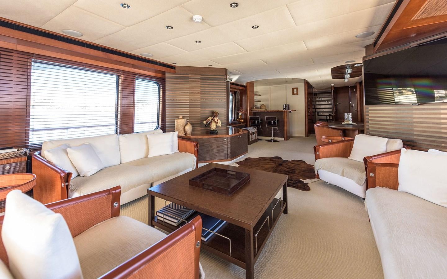 a living room with a large window aboard LITTLE PERLE Yacht for Sale