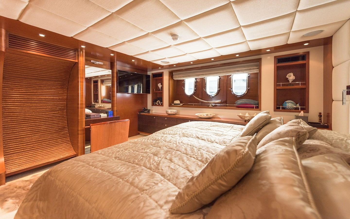 a bed in a room aboard LITTLE PERLE Yacht for Sale