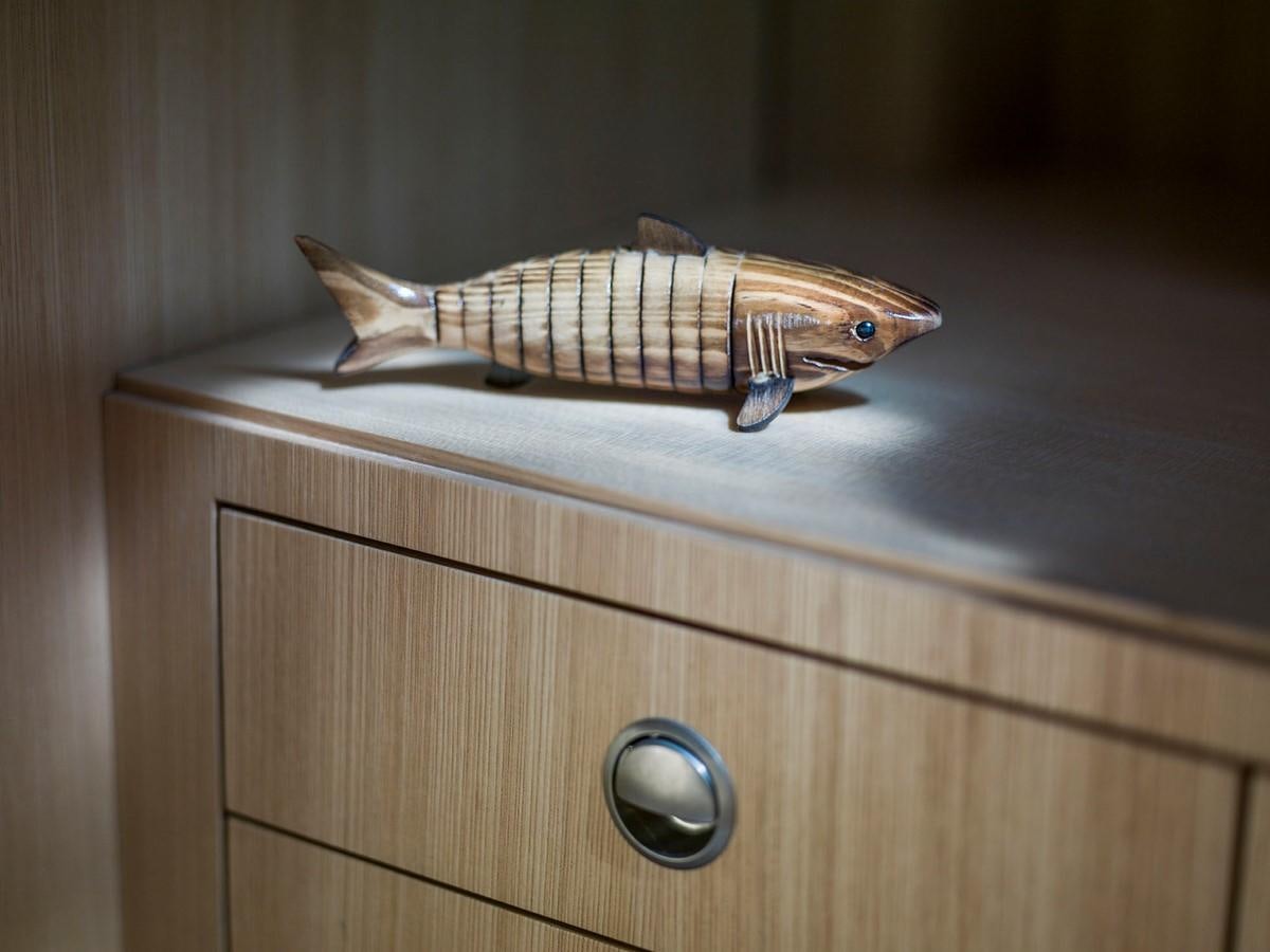 a fish on a dresser aboard SATU Yacht for Sale