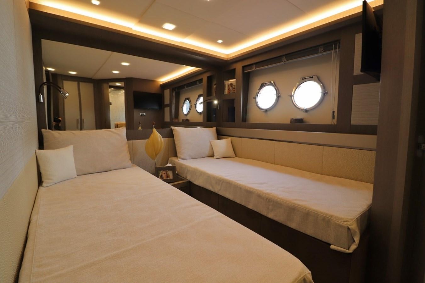 a couple of beds in a hotel room aboard MONTE CARLO YACHTS 86 Yacht for Sale