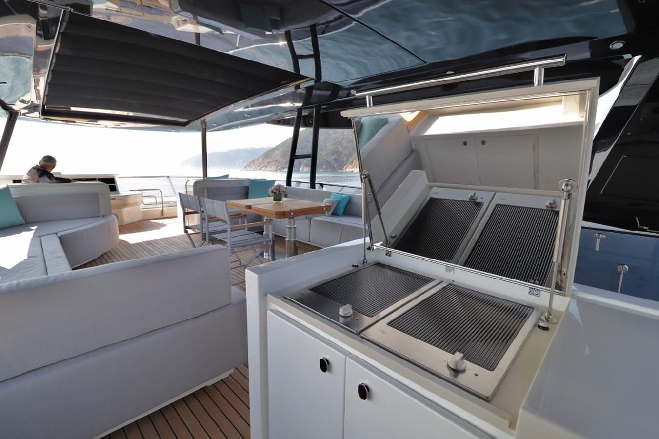 a boat with a grill aboard MONTE CARLO YACHTS 86 Yacht for Sale