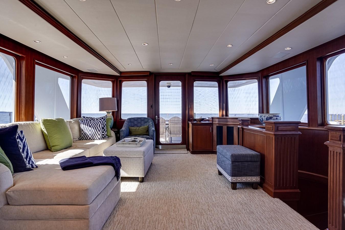 a large bedroom with a large open window aboard CHECKERS Yacht for Sale