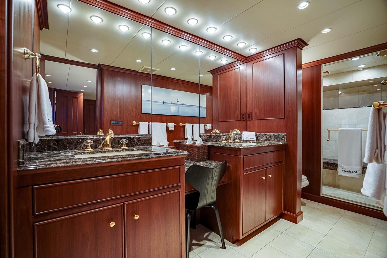 a bathroom with a large sink aboard CHECKERS Yacht for Sale