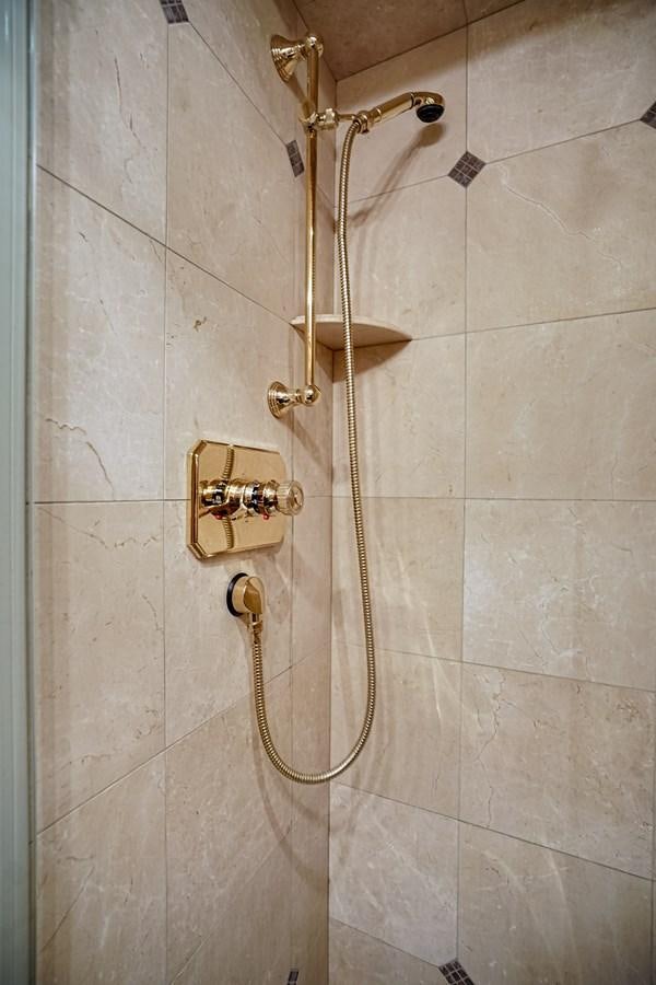 a shower with a chain from it aboard CHECKERS Yacht for Sale