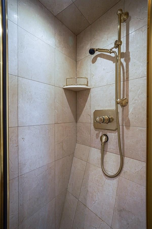 a shower with a metal handle aboard CHECKERS Yacht for Sale