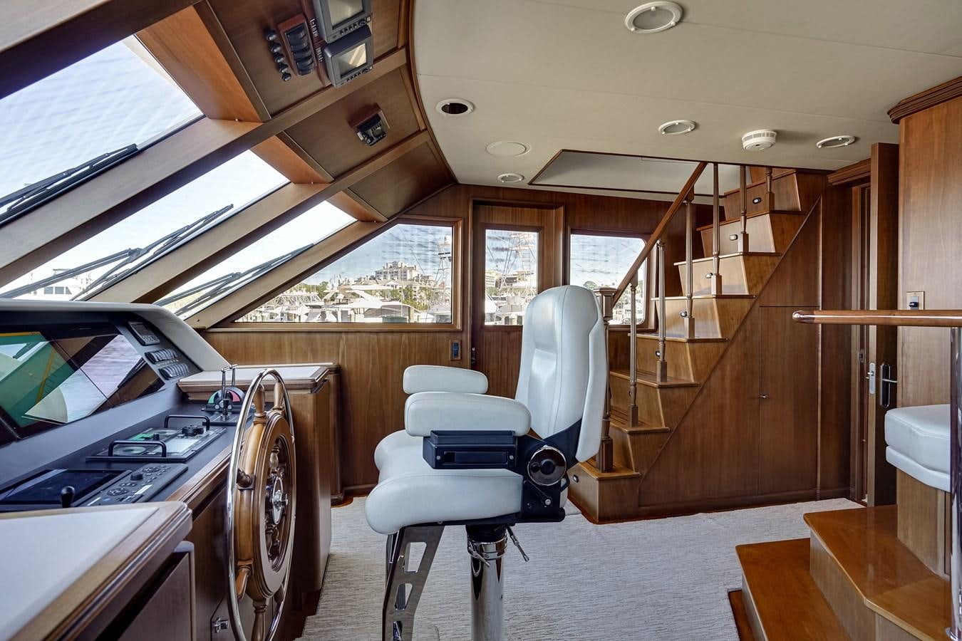 a room with a car and a treadmill aboard CHECKERS Yacht for Sale
