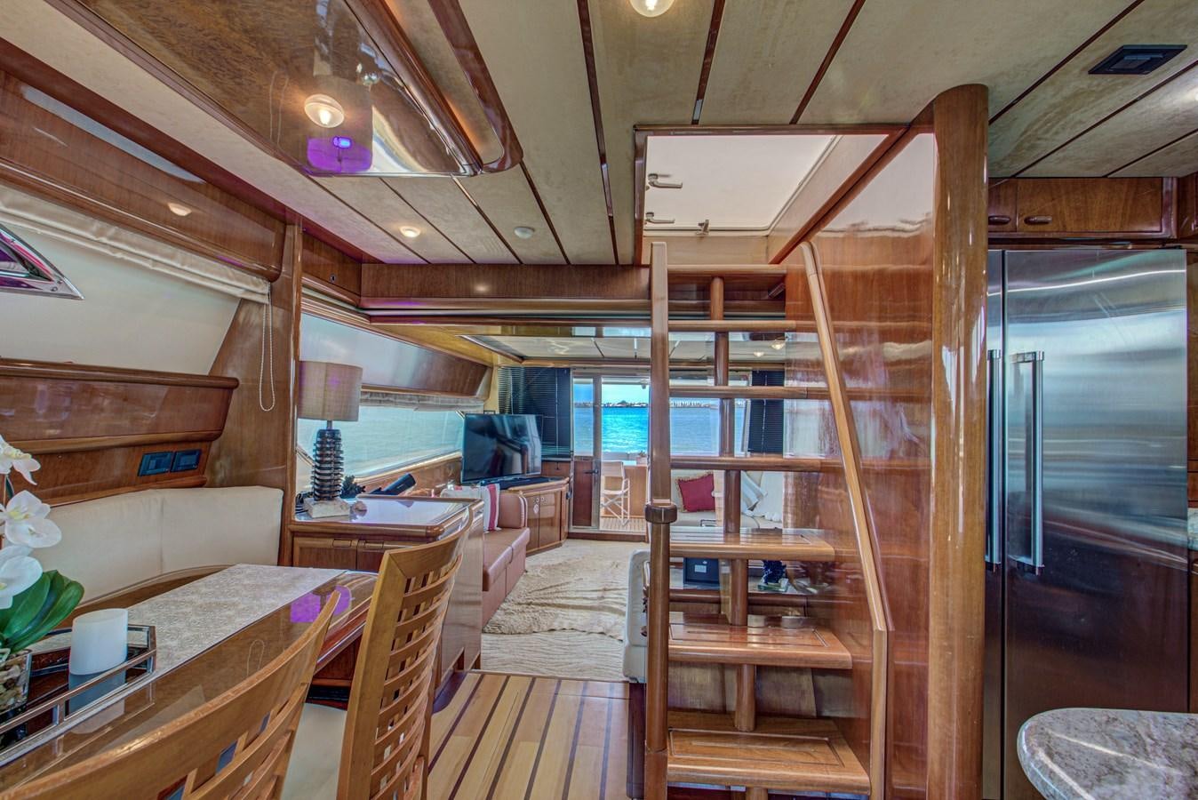 a wood cabin with a wood staircase aboard FERRETTI Yacht for Sale