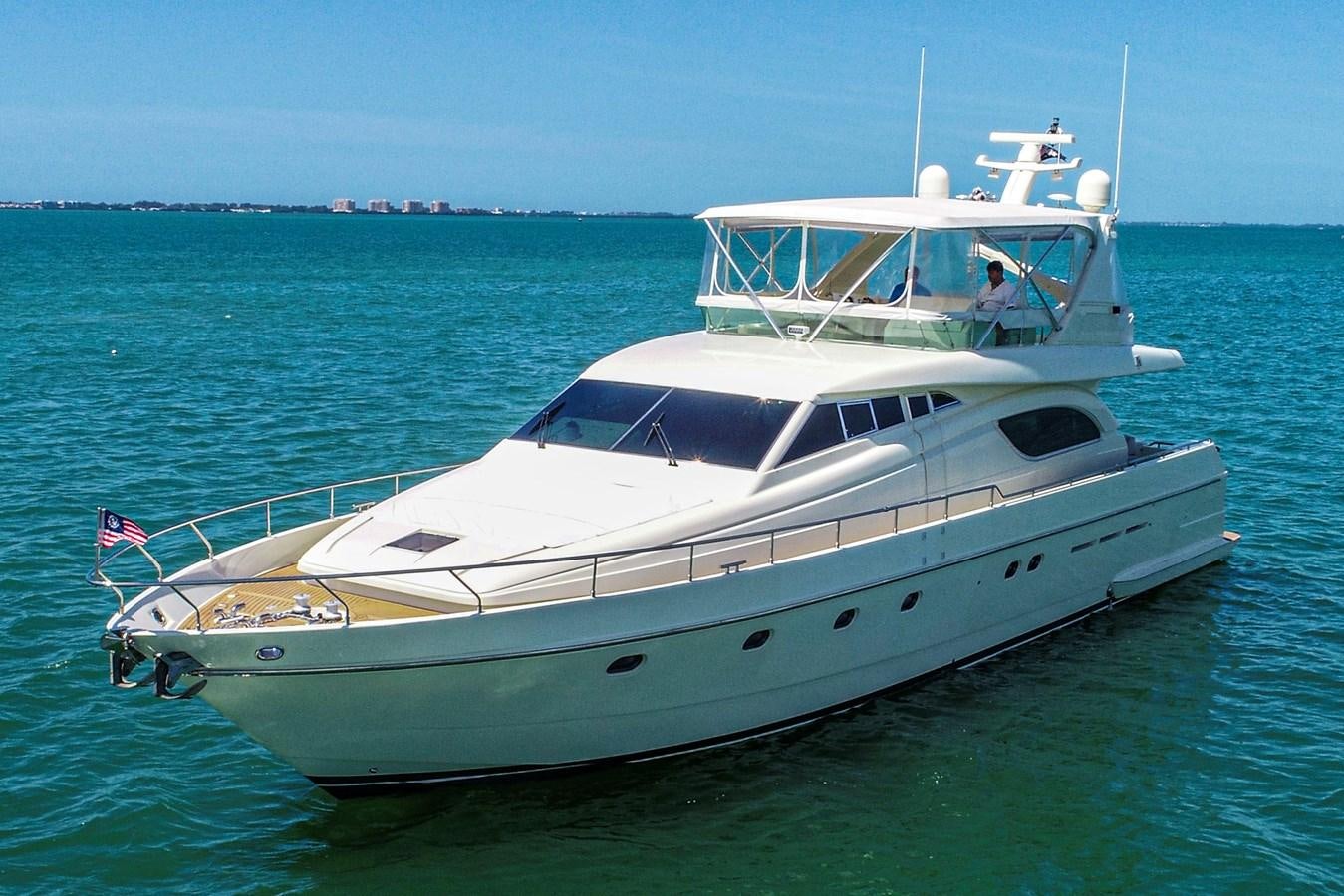 a white yacht in the water aboard FERRETTI Yacht for Sale