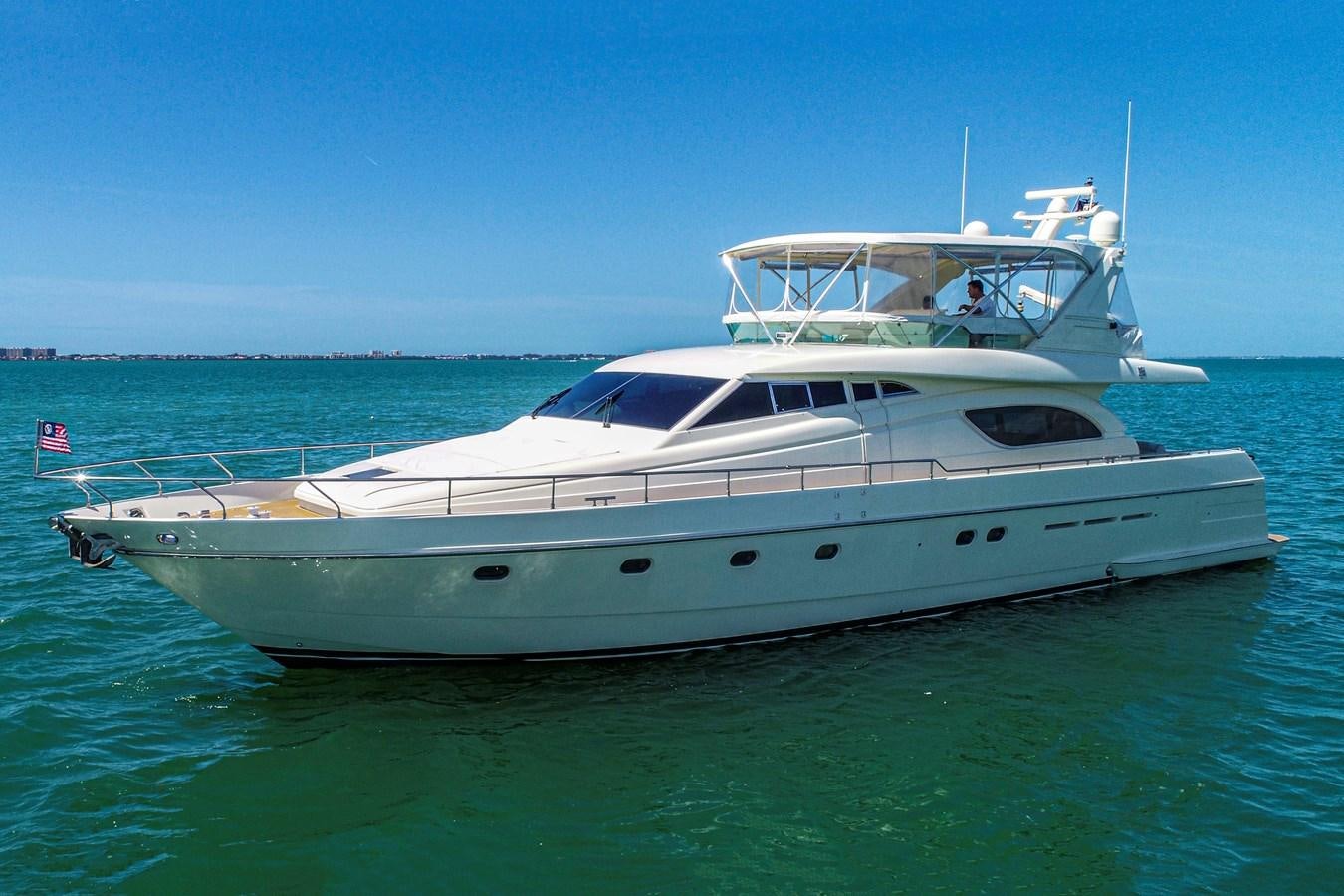 a white yacht in the water aboard FERRETTI Yacht for Sale