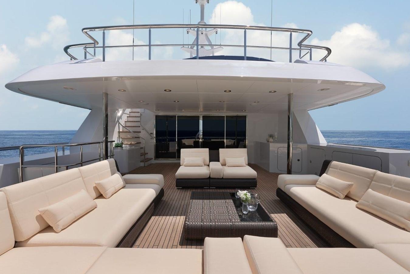 a large white boat on a large body of water aboard EP150 Yacht for Sale