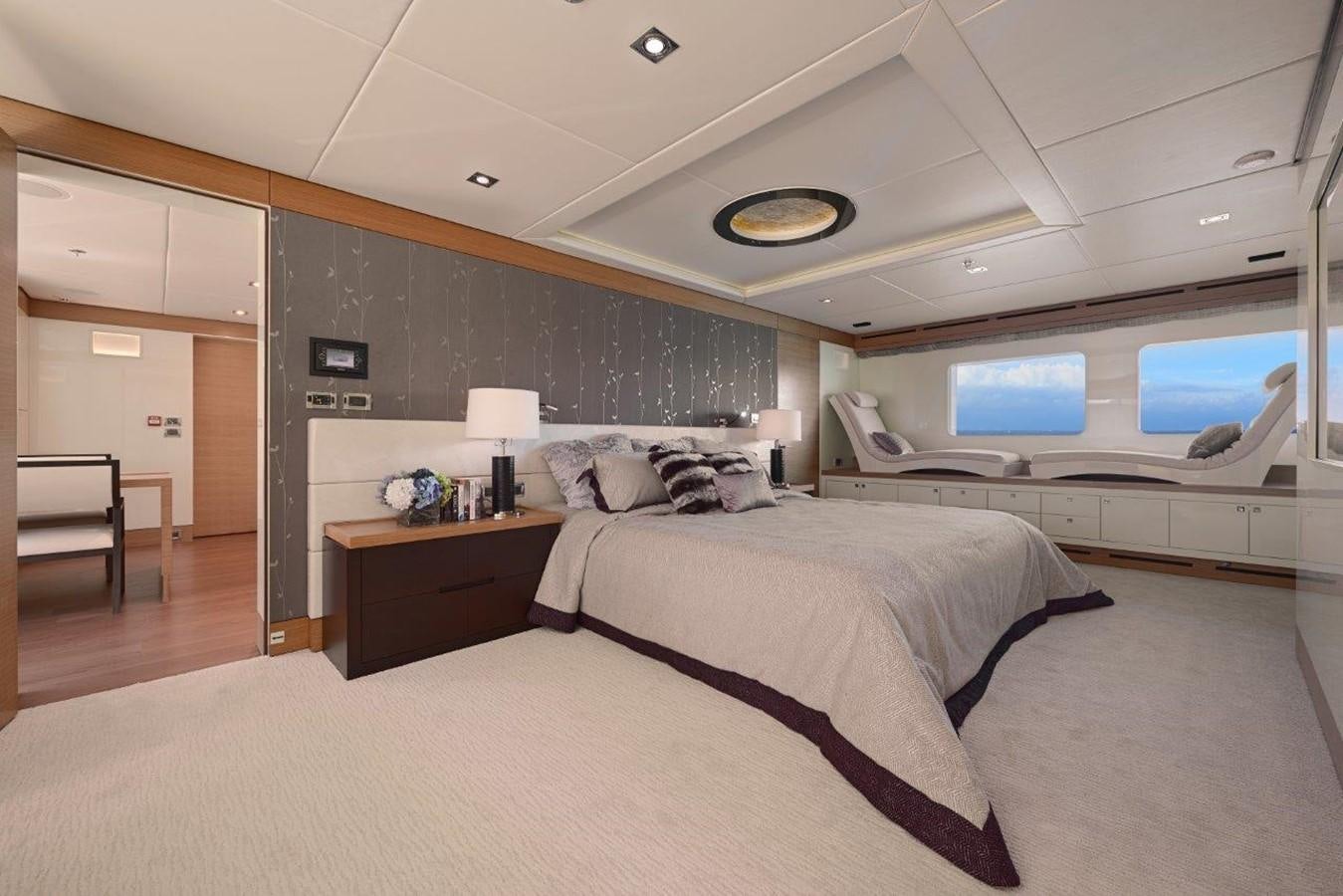 a room with a bed and a desk aboard EP150 Yacht for Sale